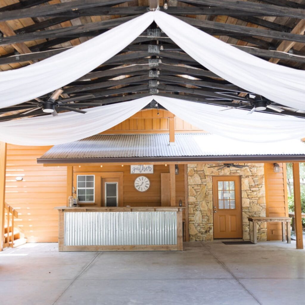 image of white 8-pt draping with sweetheart table backdrop at Chapel Valley Farm in Florida